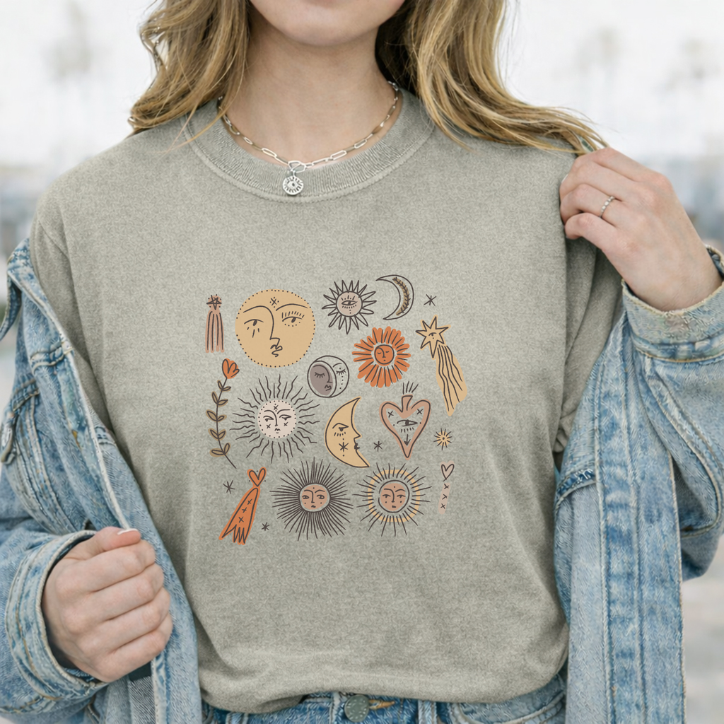 Neutral women's graphic tee featuring boho celestial design, relaxed fit everyday style shirt