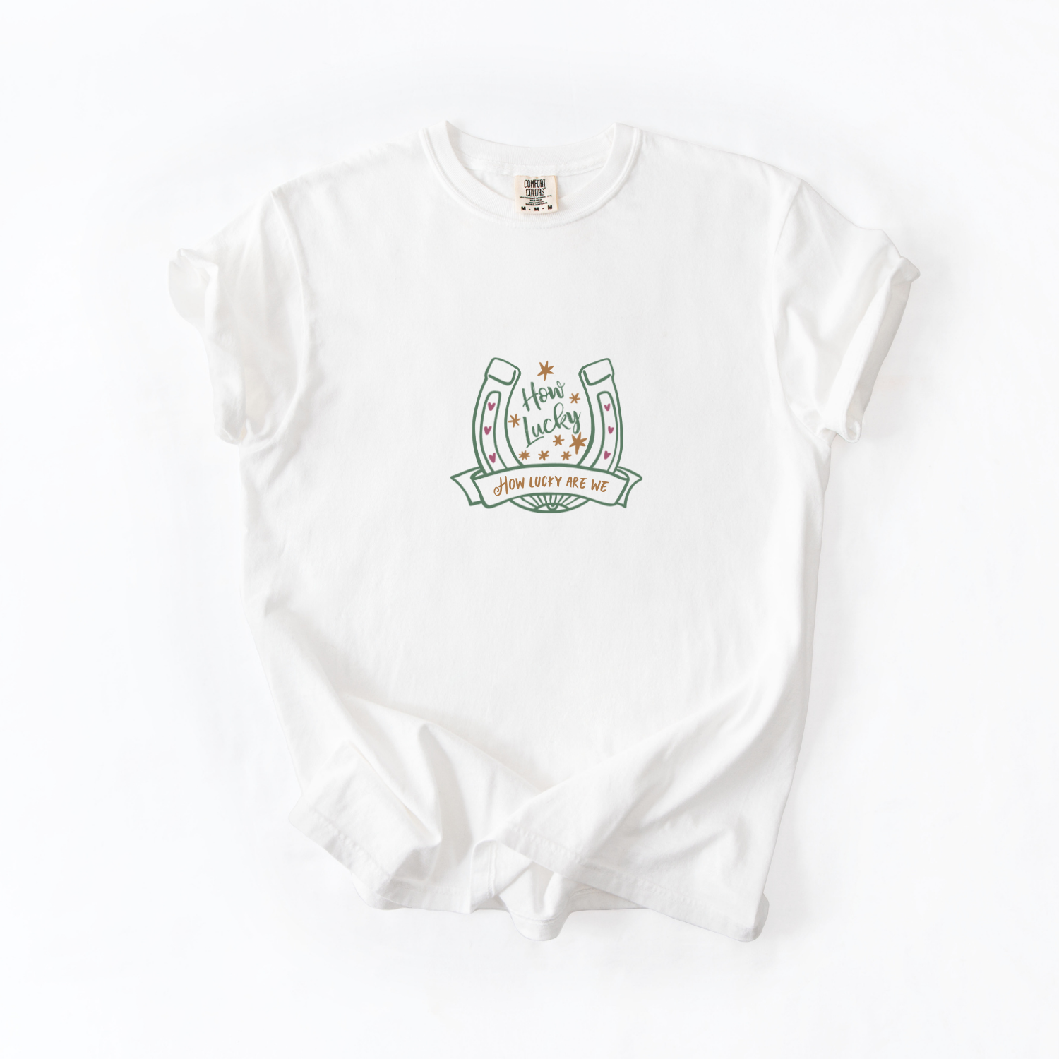 White shirt with a graphic design of a cute horse shoe