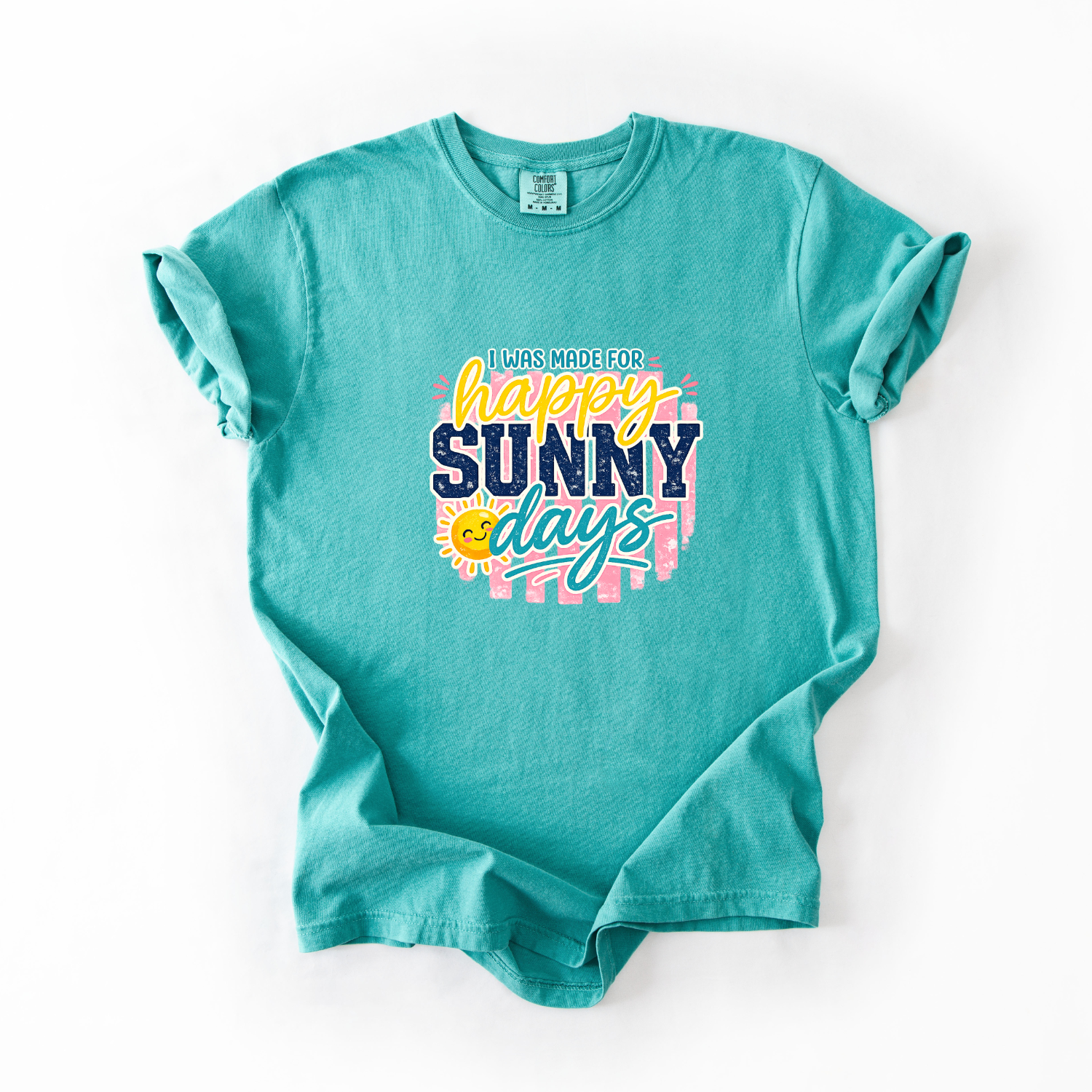 Teal t-shirt with 'happy sunny days' text and sun graphic on a white background