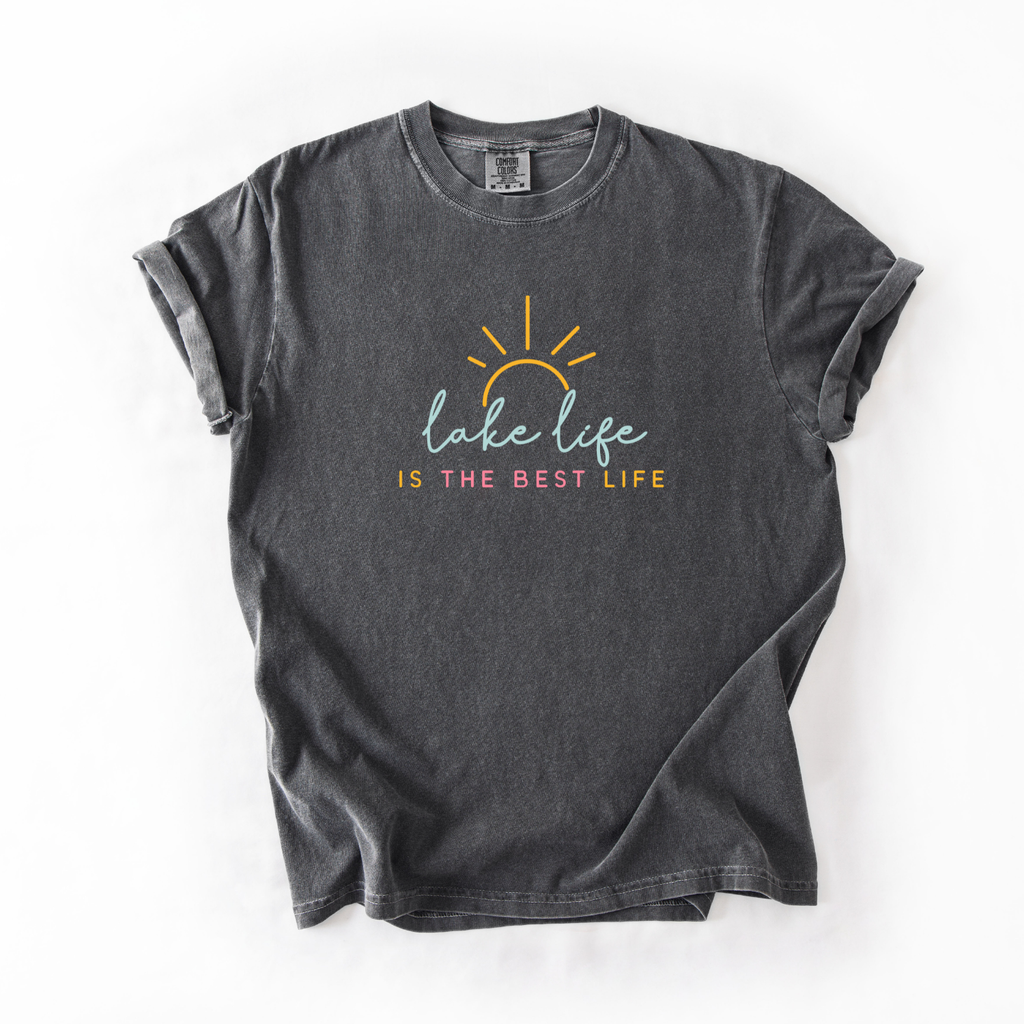 Black t-shirt with 'Lake Life is the Best Life' text and sun graphic on a white background