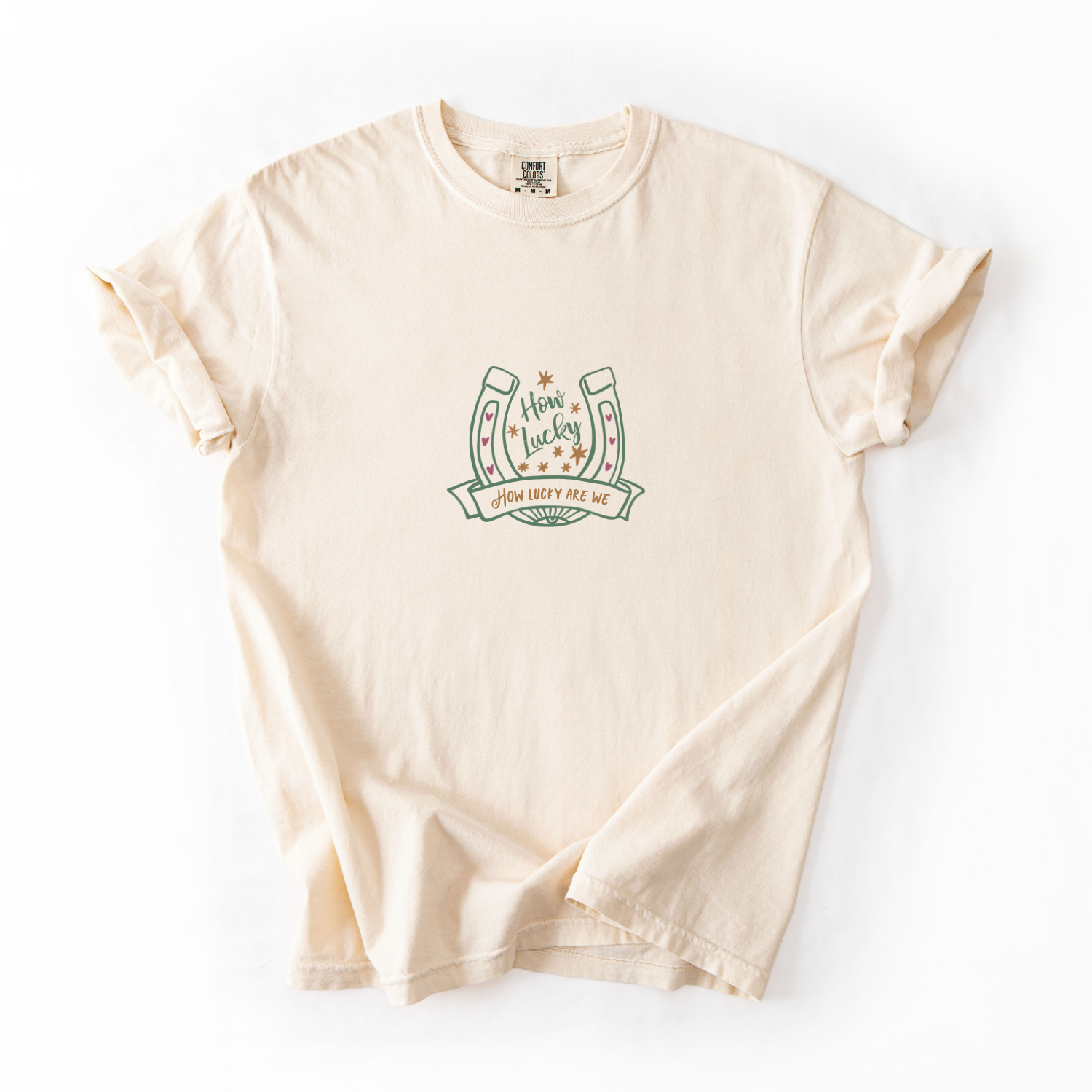 Ivory comfort colors shirt with a horseshoe and text that reads "how lucky are we"