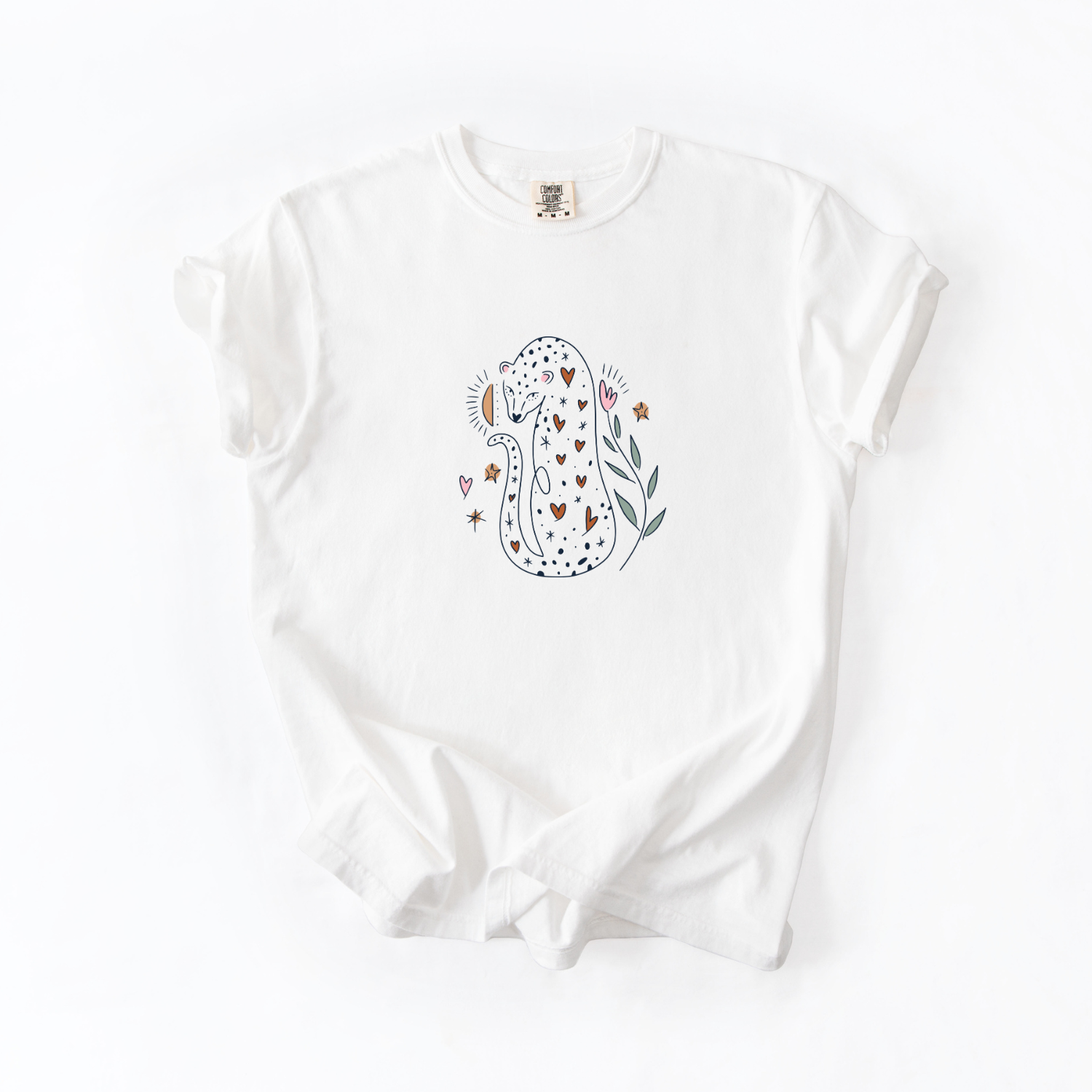 Women's leopard graphic t-shirt with minimalist animal illustration on a soft neutral tee, casual boutique style shirt for animal lovers